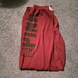 maroon (pink) sweatpants.